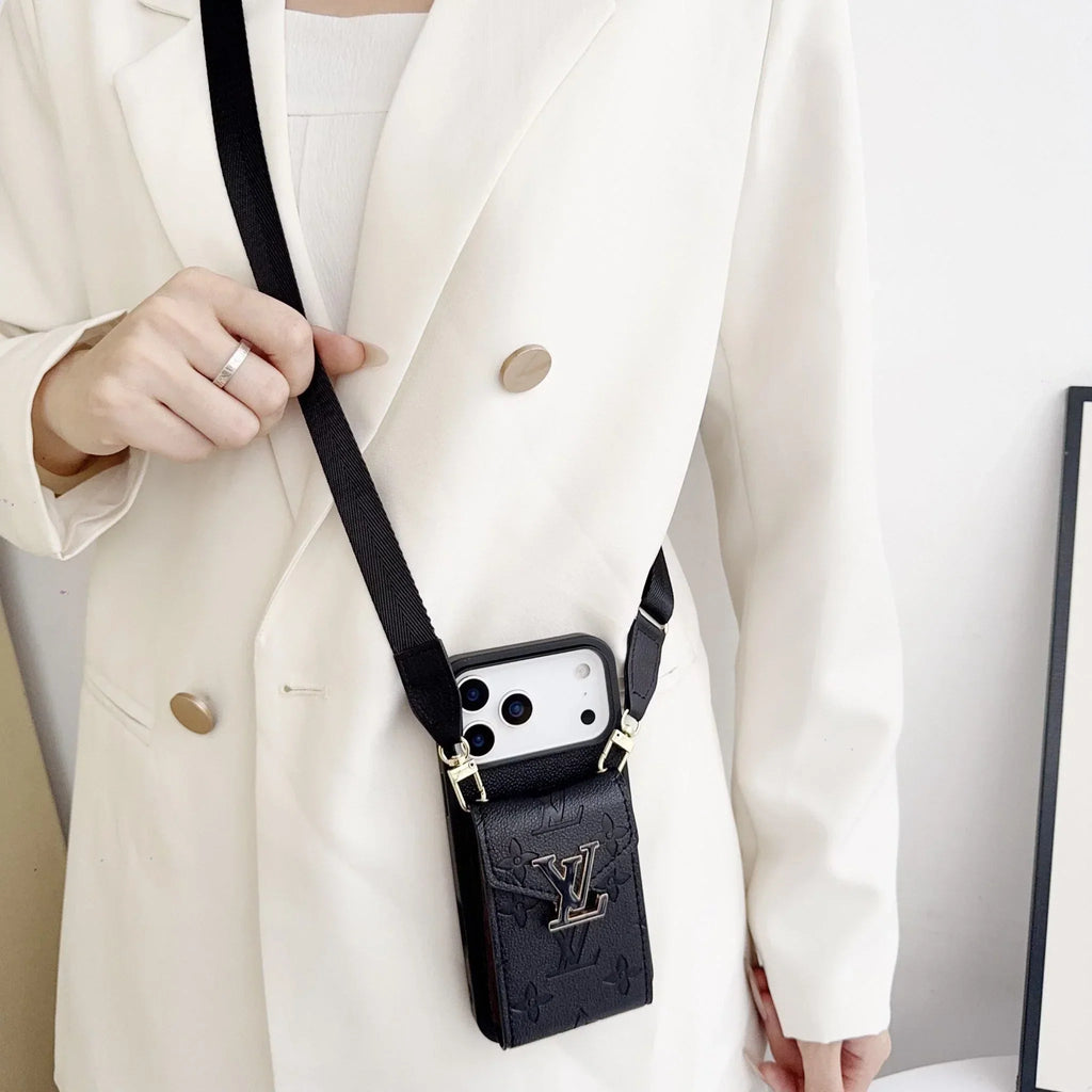 Black wallet phone case worn crossbody over a light-colored jacket